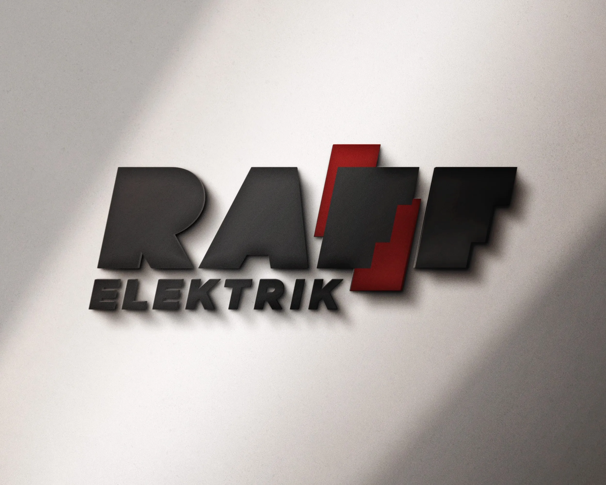 The 'Raff Elektrik' logo as wall signage: heavy black capitals with a red bolt of lightning striking down through them.