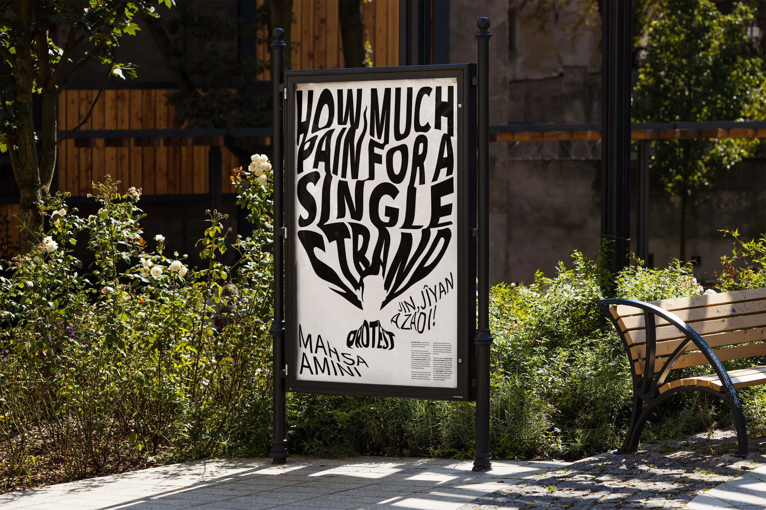 A purely typographic protest poster in a street display case: the lettering 'How much pain for a single strand' forms a strand of hair, below it the slogan 'Jin, Jîyan, Azadî' and the name Mahsa Amini.